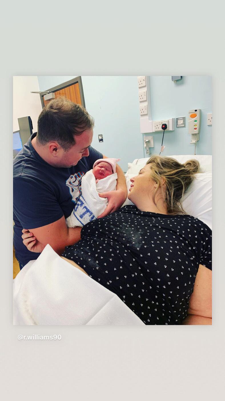 Delilah's first cuddle with mum and dad