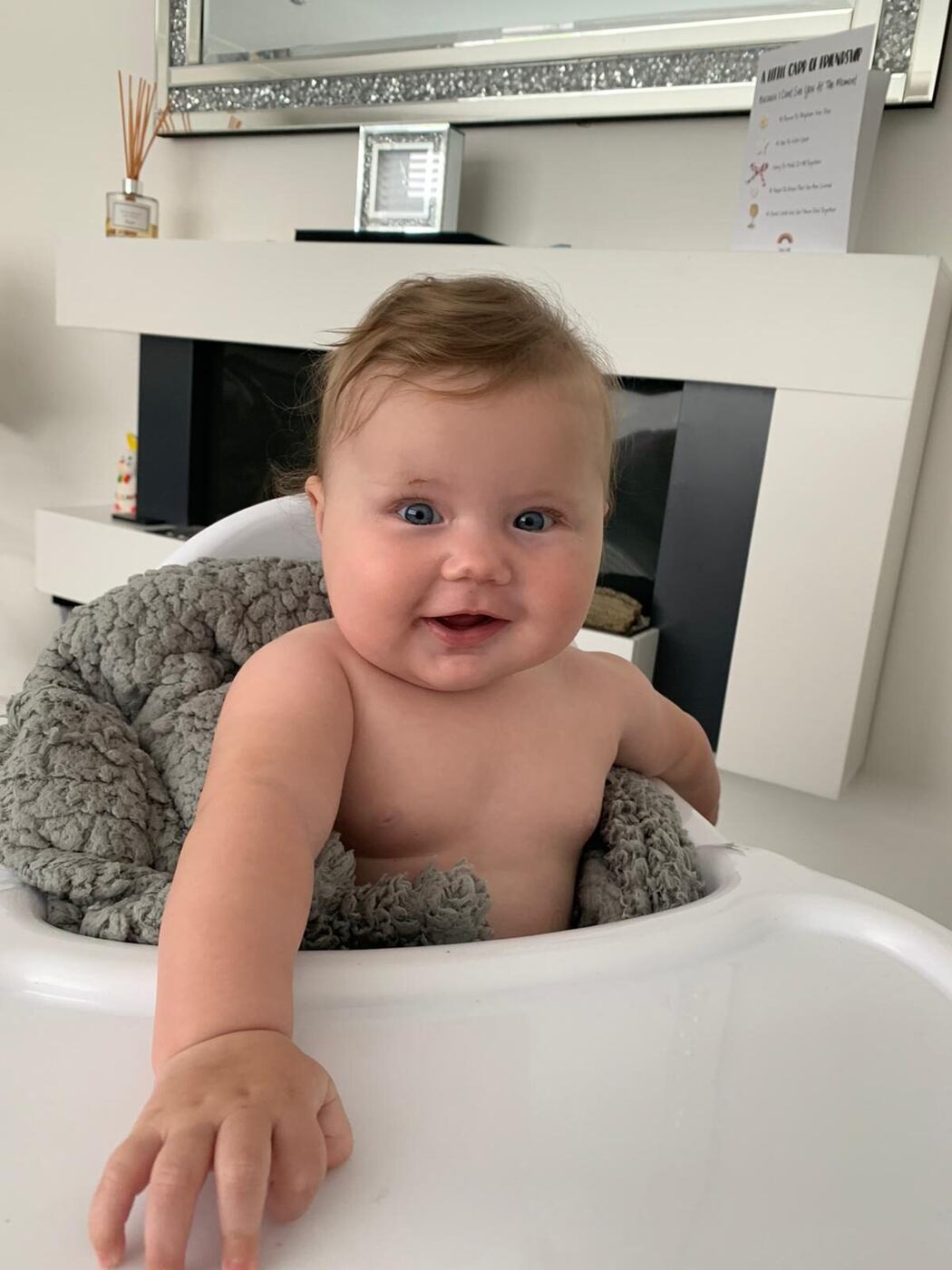 Delilah smiling as a baby